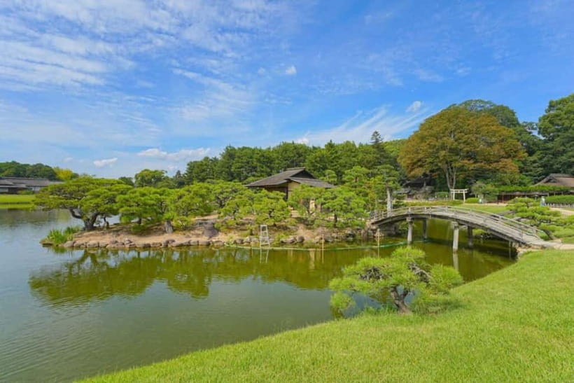 1-Day Tour from Okayama: Kurashiki, Gardens & Okayama Castle - Korakuen Garden, with ponds, tea houses, and open views