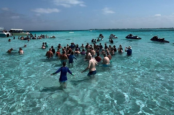 3 Stop Boat Tour Stingray City Coral Gardens and Starfish Point - Coral Gardens or the Barrier Reef for a proper snorkel