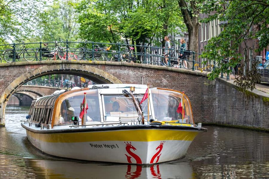 Amsterdam: City Centre Canal Cruise & Free Flower Cocktail - The Anne Frank House and Westerkerk from the water
