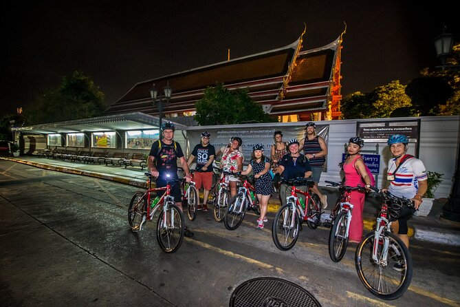 Bangkok: Night Bike Tour with Temples & Flower Market Visit - Rama VIII Bridge and the Chao Phraya at sunset