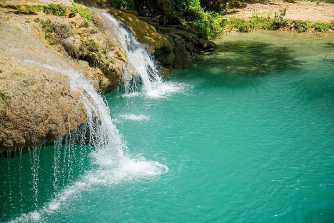 Blue Hole Waterfalls and Rasta Garden from Montego Bay - Meeting Calby beside the river