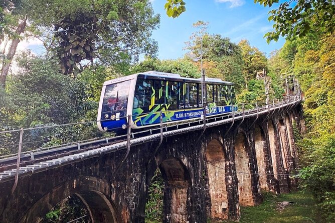 Discover Penang's Best: Hill, Beach, Botanic Gardens & Kek Lok Si - Wat Chayamangkalaram and the giant Reclining Buddha