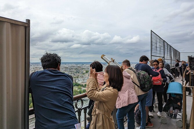 Eiffel Tower with 2nd Floor Access & Trocadero Gardens Tour - Entering the Eiffel Tower and reaching the second floor