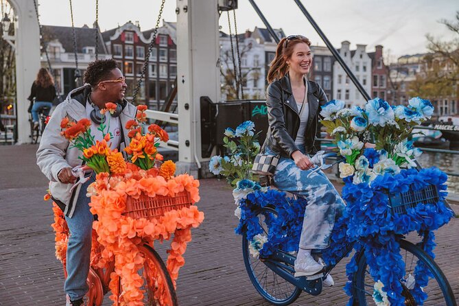 Explore Amsterdam canals on iconic Flower Bikes - Starting near Nieuwezijds Voorburgwal