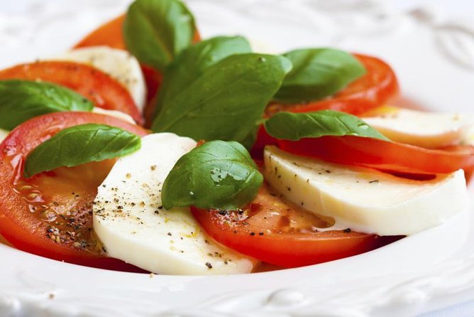 Farm-to-Table Experience: Olive Oil, Garden Tour & Nonna’s Lunch - Olive oil, mozzarella, and the tasting table