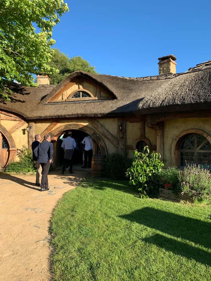 From Auckland: Hobbiton & Hamilton Gardens Small Group Tour - A drink at the Green Dragon Inn