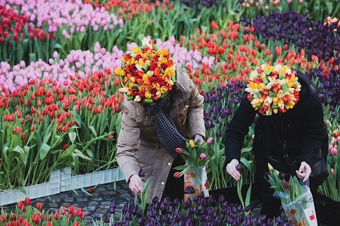 Full-Day Trip From Amsterdam to Keukenhof, Zaanse Schans + Cruise - Finishing through Amsterdam’s canal ring