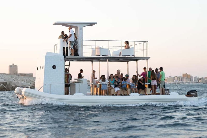 Giardini Naxos: Dolphin Catamaran Sunset Tour with Aperetif - Crew, atmosphere, and film connections