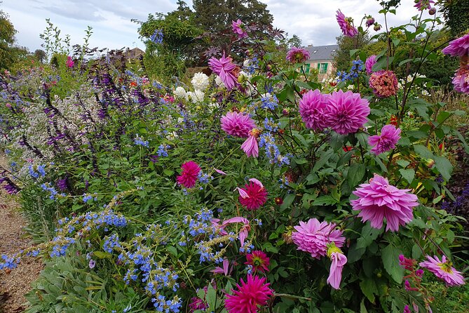 Giverny Half-Day Guided Tour from Paris - Walking through the Clos Normand flower garden