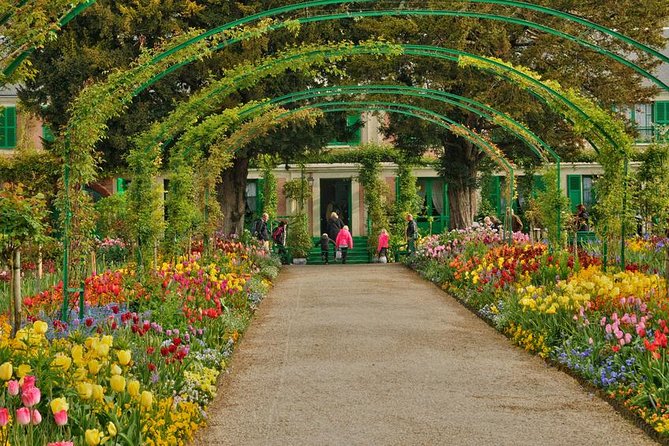 Giverny Private Trip with Monet's House, Gardens & Impressionism Museum - Crossing the Japanese bridge at the water garden