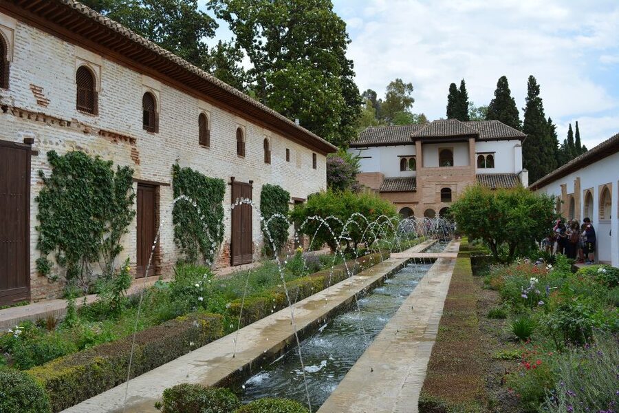 Granada: Alhambra and Generalife Gardens Guided Tour - Paseo de los Cipreses and the first gardens