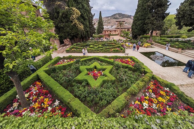 Granada, Visit Alhambra with Nasrid palaces, gardens and Alcazaba - Carlos V Palace, a sharp change in style