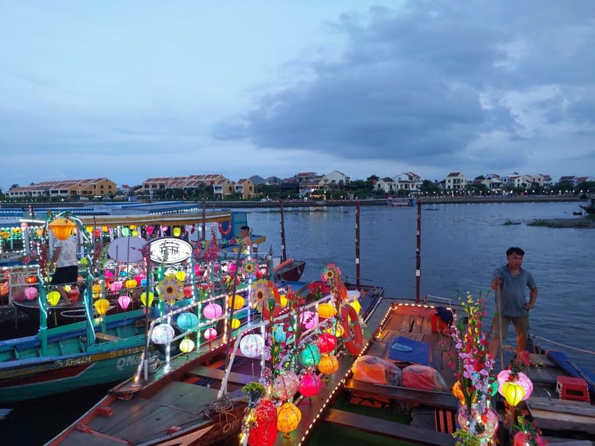 Hoi An Boat Lantern With Release Flower Hoai River At Night - Holding a flower lantern and making a wish