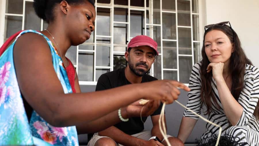 Kigali: Traditional Basket Weaving in a Garden - Sitting Down to Weave in Kigali