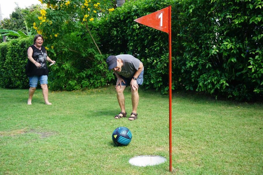 Koh Samui: Football Golf & Botanical Gardens - Checking in with footballs, scorecards, and shoes