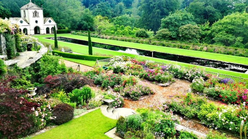 Llandudno: Snowdonia Bodnant Gardens & Castles Private Tour - Menai Bridge and the final coastal return