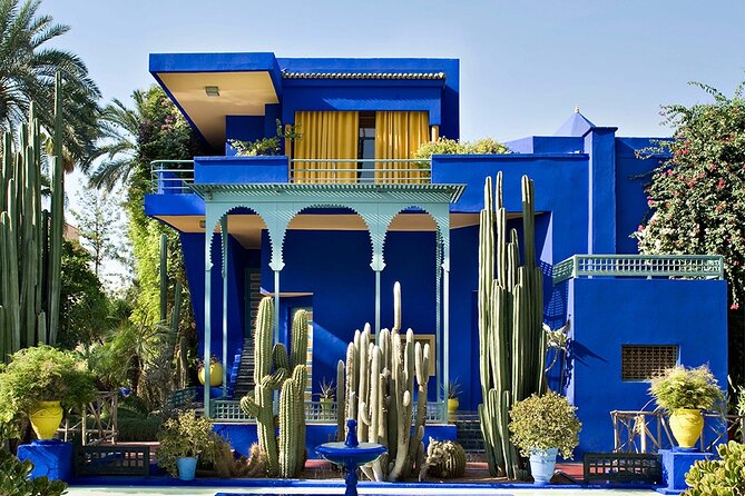 Majorelle Garden, St Laurent,Berber Museum Round-trip & Tickets - Entering Majorelle Garden and its cobalt-blue buildings
