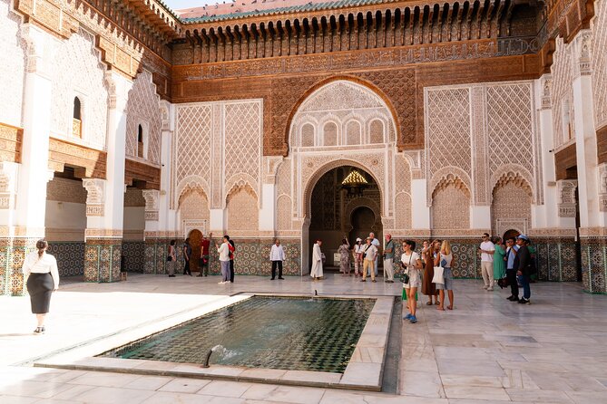 Marrakech: Ben Youssef Madrassa, Secret Garden and Medina Tour - Meeting at Café de France and finding your bearings