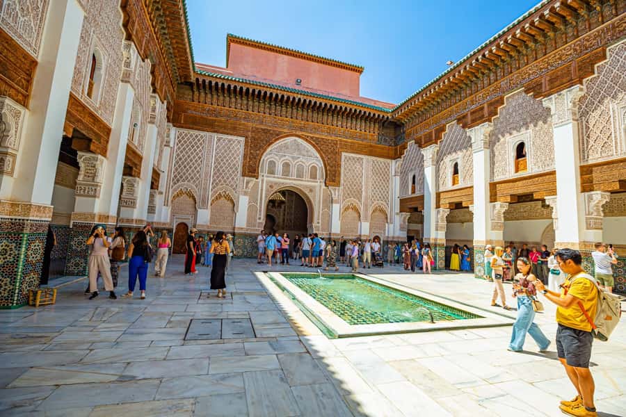 Marrakech: Madrasa Ben Youssef, Secret Garden & Medina Tour - What the guide adds to the experience