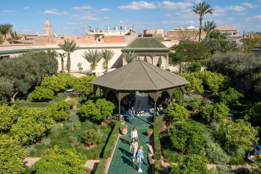 Marrakech: Madrassa Ben Youssef, Secret Garden & Medina Tour - Koutoubia Mosque, a useful opening landmark