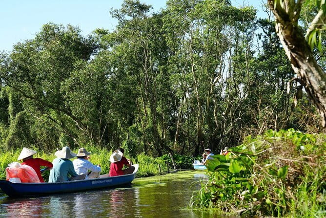 Mekong 2-Day Tour Floating Market-Bird Sanctuary-Flower Village - Son Islet, fish farms, fruit, and local snacks