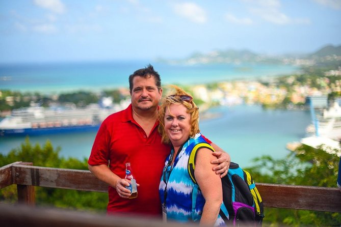 Mudbaths, Waterfall & Botanical Gardens Tour - All Inclusive - Cooling off at Toraille Waterfall