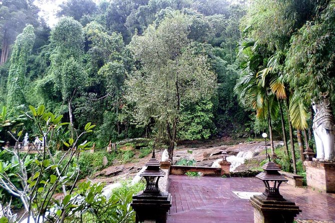 One Day Tour Doi Suthep Temple, Palad Temple, Orchid Farm, Longneck hill tribe village (Private tour) - Private transport and the value of a guide