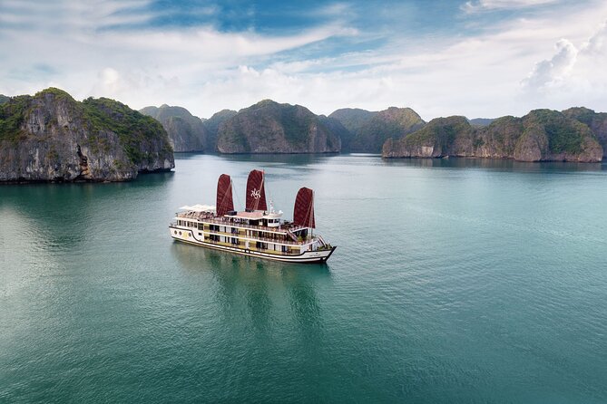Orchid Cruises Halong Bay 2Days/1Night With 5 Star all included - Day two: Tai Chi, canoe time, and the return to shore