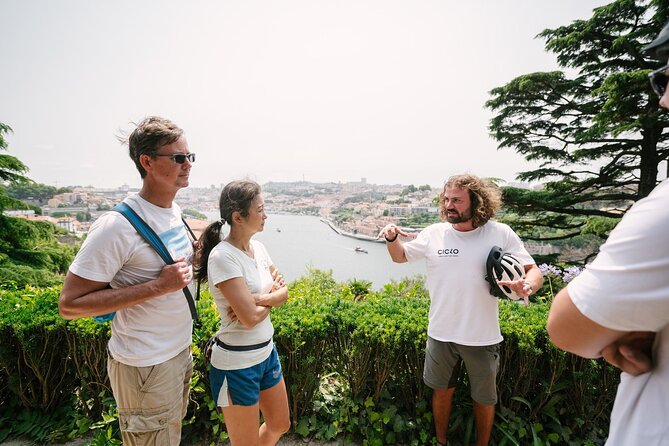 Porto Riverbank E-Bike Tour - Atlantic Coast, Gardens - Massarelos tiles and São Francisco Church