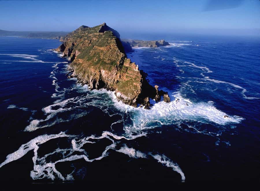 Private Cape Peninsula + Kirstenbosch Garden Guided Tour - Chapman’s Peak turns the drive into an attraction
