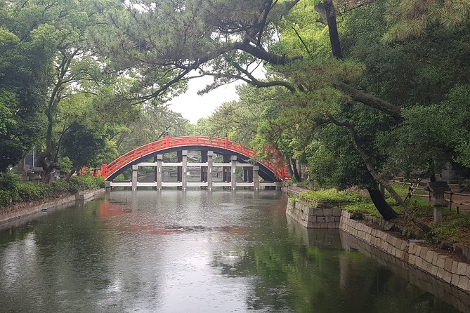 Private Car Full Day Tour of Osaka Temples, Gardens and Kofun Tombs - Sumiyoshi Taisha makes the religious contrast clear