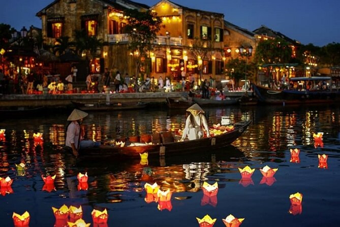 River Boat Ride by Night with Drop Flower Lantern in Hoi An - Meeting at the Kazimierz Kwiatkowski bust
