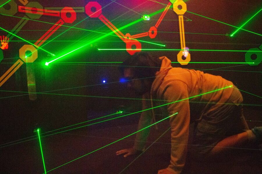 San Francisco: PIER 39 Flyer, 7D Ride, & Laser Maze Ticket - Crawling Through the Laser Maze
