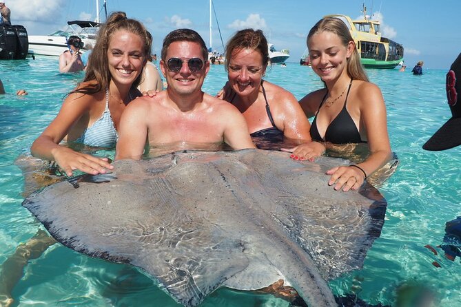 Small Group 7 Mile Beach Stingray City and Coral Gardens Tour - From the beach to the boat