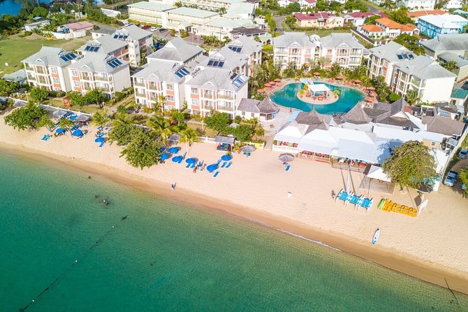 Spa Day Pass at Bay Gardens Beach Resort & Spa - Paddleboarding, swimming, and a little action