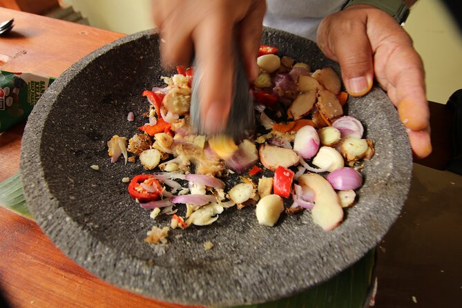 Spice Garden, Jamu & Cooking Class in Bali Village - Rice terraces, herbs, and a bamboo farmer’s instrument