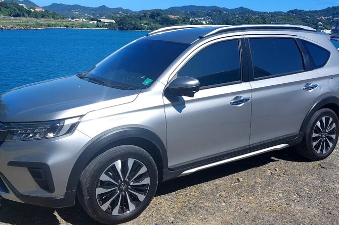 St Lucia Airport Transfer to ANY Bay Gardens location - A private vehicle for your group