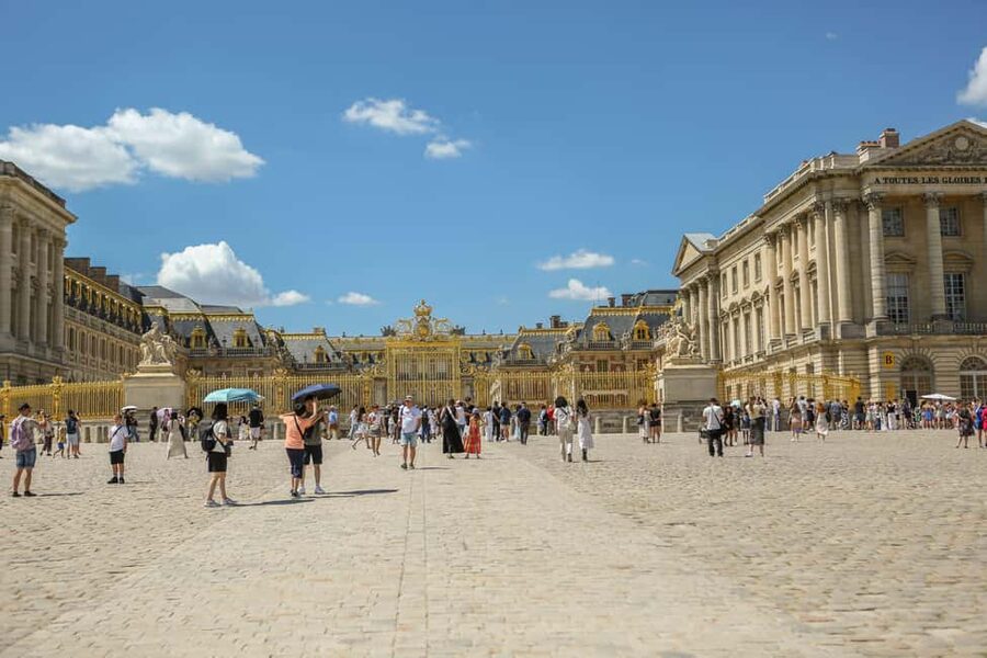 Versailles Palace and Gardens Entry with Seine river Cruise - Versailles begins with a timed palace entry