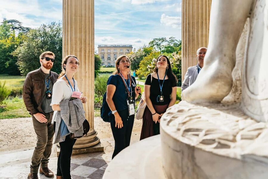 Versailles: Palace, Gardens & Queen’s Estate Guided Tour - The gardens: fountains, statues, and royal scale