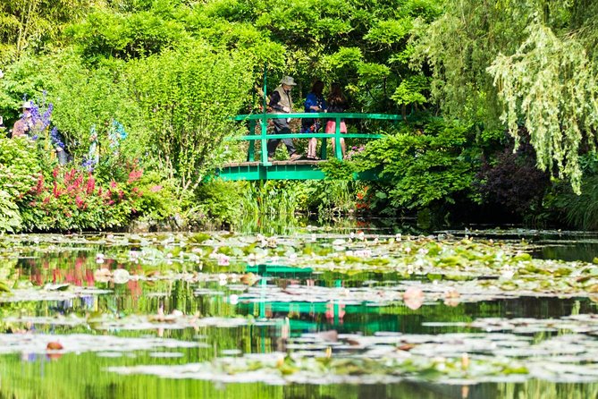 Versailles Timed Entrance Ticket and Giverny Small Group Day Trip from Paris - Giverny begins with Monet’s flower garden