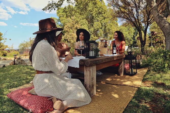 Wine tasting in private gardens overlooking the vineyards - Who will enjoy this experience most